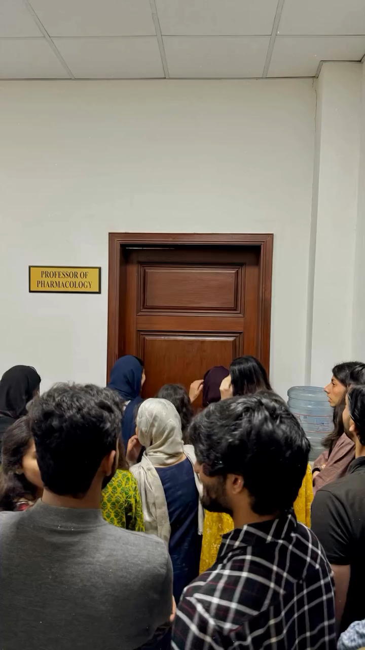 Students outside office